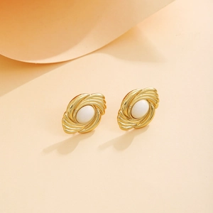 Vintage French style gold swirl stud earrings with textured pearls for women