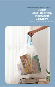 Strong white drawstring trash bag carrying snack boxes to demonstrate high load capacity