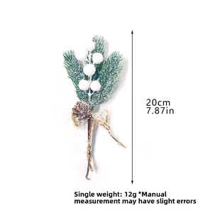 Detailed view of 20cm frosted pine needles with white berries and rustic twine bow