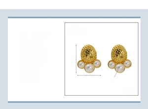 Detailed view of 18K gold plated stainless steel pearl earrings with hammered texture