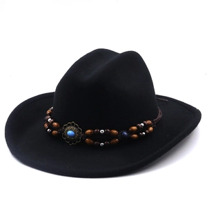 Close-up of wool fedora hat with ethnic bead band and turquoise stone detail