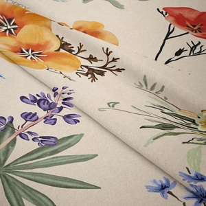 Macro detail of high-quality floral tapestry fabric showing thick canvas texture and colors