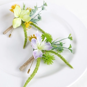 Elegant forest-style artificial boutonniere with silk flowers and jute-wrapped stems