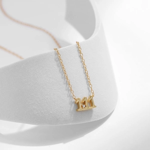 Gold-plated 925 sterling silver necklace with 111 pendant and small central diamond
