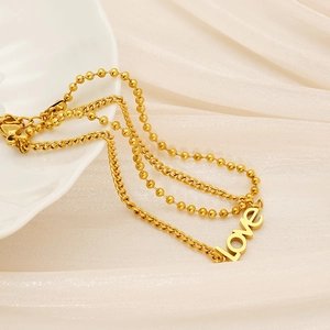 Bracelet double chaîne en acier inoxydable doré avec pendentif Love sur tissu en soie