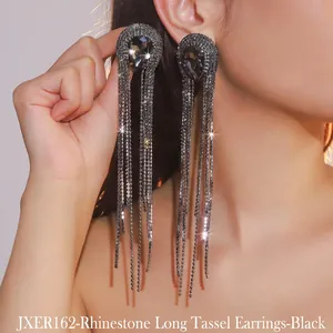Close-up of black rhinestone long tassel earrings showing shimmering crystal details