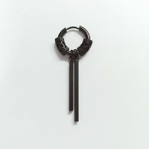 Detail of industrial punk black matte hoop earring with double square bar pendants