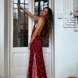 Summer halter backless maxi dress with floral print, side slit, and patchwork detail