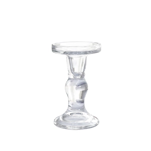 Minimalist transparent glass Roman column candle holder with a wide base and fluted design