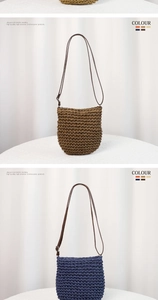 Detail of woven straw bucket bag showing tight texture and brown leather shoulder strap