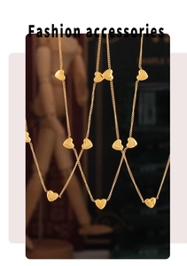 Detailed view of layered 18K gold plated heart pendant necklace with shiny polished finish
