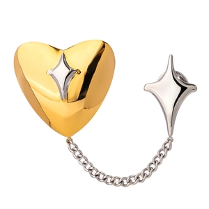 Elegant gold heart and silver star brooch pins connected by a sleek metal chain link