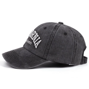 Washed dark grey cotton baseball cap with white CALIFORNIA 1850 embroidery, 45-degree angle