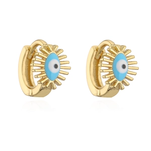 Detailed view of gold evil eye mini hoop earrings with blue enamel and polished finish