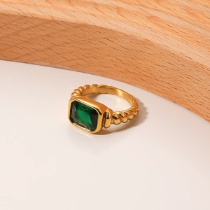 18K gold plated stainless steel ring with emerald green stone and twisted band