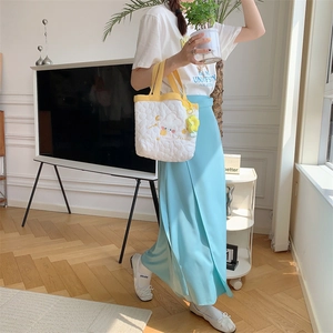 Quilted white handbag with yellow handle featuring a cute cloud embroidery and floral charm