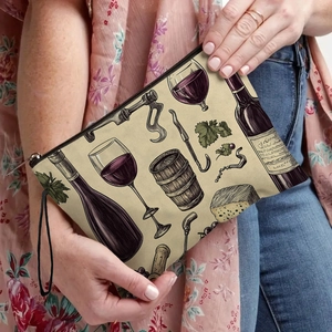 Canvas makeup bag with vintage wine print held by model for daily lifestyle use