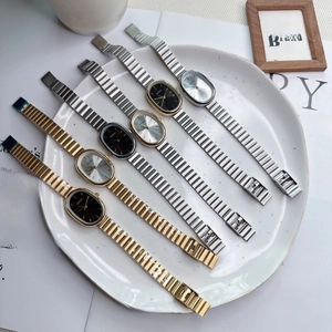 Elegant oval dial quartz watches with metallic chain straps in silver and gold finishes