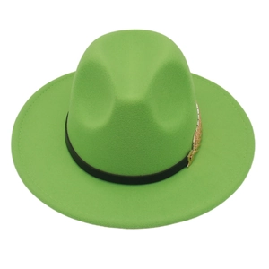 Detail of bright green fedora hat with black band and golden leaf accent decoration