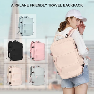 Detailed view of spacious pink travel backpack featuring ergonomic shoulder straps for comfort