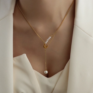 French style 18k gold plated pin necklace with pearl fringe pendant on female model