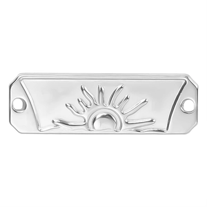 Detailed macro view of 18k gold-plated sun embossed rectangular stainless steel pendant