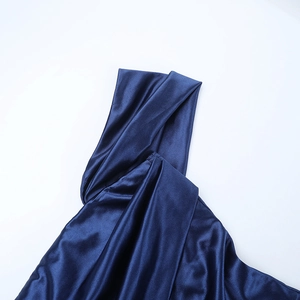 Close-up of elegant off-shoulder neckline on a navy blue satin split evening gown