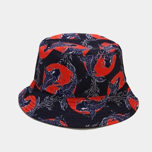 Close-up of Japanese koi fish print and rising sun pattern on cotton bucket hat