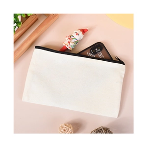 Blank white canvas zipper pouch with black zip, featuring a phone and snowman pen inside