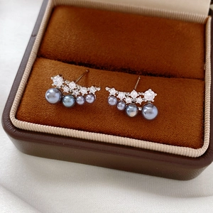 Exquisite 18k gold plated curved earrings featuring cubic zirconia and grey pearls