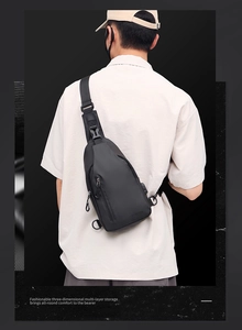 Outdoor waterproof chest bag with multi-layer storage shown on model's back