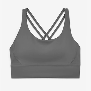 Dettaglio delle spalline incrociate sulla schiena del reggiseno sportivo grigio