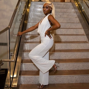 Women's chic white halter neck backless two-piece set with draped wide-leg trousers