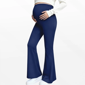 Macro detail of high-waisted maternity flare leggings with supportive belly band
