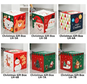 Collection of six Christmas gift boxes featuring Santa Claus and snowman patterns