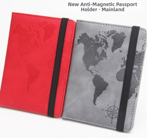 Macro view of RFID blocking leather passport cover with world map and compass design