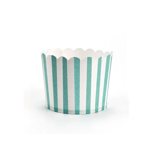 Detailed view of blue and white striped muffin liners with scalloped edges for baking