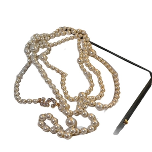 Elegant multi-layer pearl necklace with zircon number 5 and gold-tone clasp