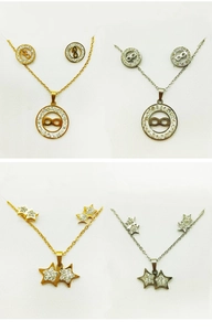 Detailed grid showing gold and silver star and infinity necklaces with crystal inlay