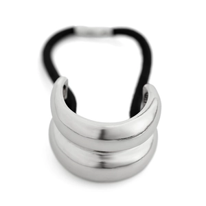 Detail of silver metallic geometric buckle on black elastic hair band with mirror finish