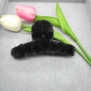 Detail of 11cm large black plush shark hair claw clip on soft display tray