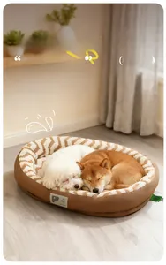 Close-up of thick oval pet bed with warm plush texture and durable leather exterior