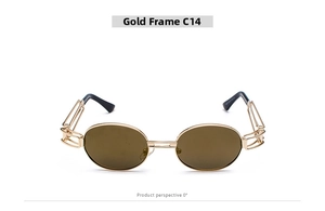 Macro shot of gold metal steampunk sunglasses frame with unique geometric hollow temples