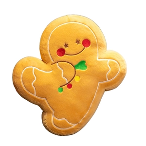 Plush gingerbread man toy with star embroidery and colorful buttons on white background