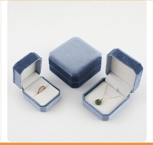 Detail view of smog blue octagonal velvet jewelry box for rings and necklaces