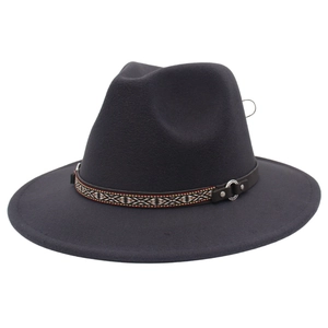 Detail of grey felt fedora featuring a tribal pattern band with leather buckle and metal ring