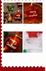 Detail of LED Christmas string lights with plated stars, globes and AA battery pack