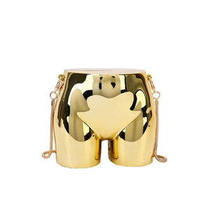 Unique gold torso shaped chain bag with mirror finish for parties and events