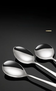 Detailed view of 304 stainless steel round spoons with mirror-polished smooth finish