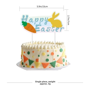 Detail of Happy Easter cake topper with rabbit and carrot graphics on a white background